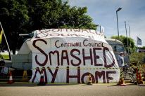 Neil Wainwright's mobile home, which he claims was smashed by Cornwall Council when they moved it Neil Wainwright's mobile home, which he claims was smashed by Cornwall Council when they moved it